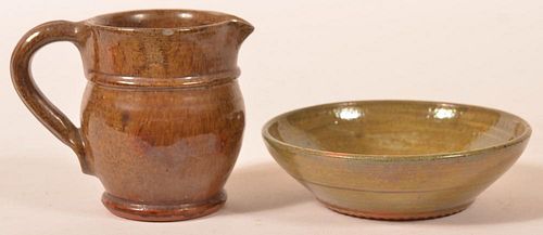 TWO PIECES OF STAHL GLAZED REDWARE.Two