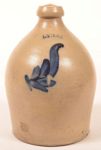 LYONS STONEWARE JUG W/ BLUE LEAF DECORATION.Lyons