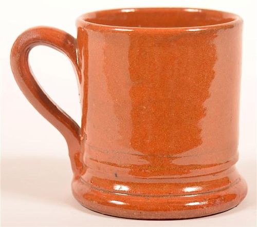 GLAZED REDWARE MUG.Glazed Redware