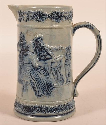 STONEWARE PITCHER WITH EMBOSSED