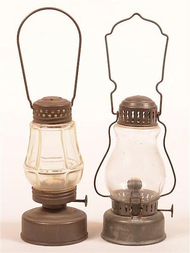 TWO VARIOUS TIN SKATER S LANTERNS Two 39c369