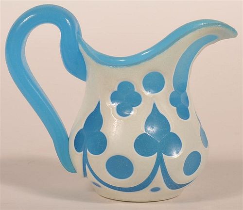 OPAQUE CUT TO BLUE BLOWN GLASS