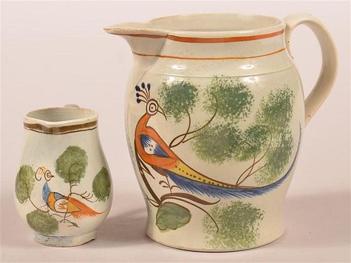 2 LEEDS SOFT PASTE PEAFOWL CREAM PITCHERS.Two