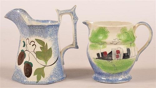 TWO BLUE SPATTER CHINA CREAM PITCHERS.Two