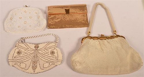 FOUR LADIES MESH AND BEADED HANDBAGS.Four