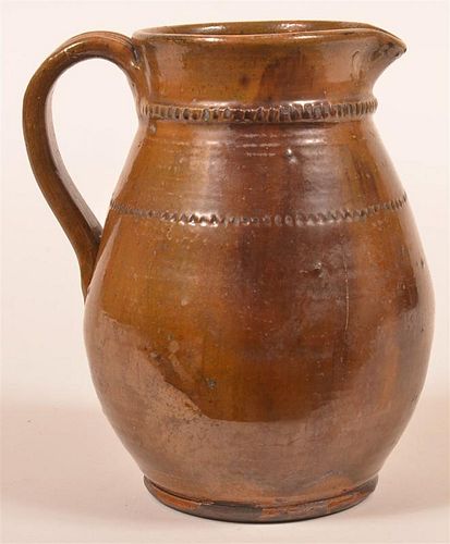 SHOONER REDWARE MEDINGER TYPE PITCHER.Shooner