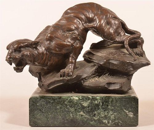 MALAYAN BRONZE SCULPTURE OF A TIGER.Malayan