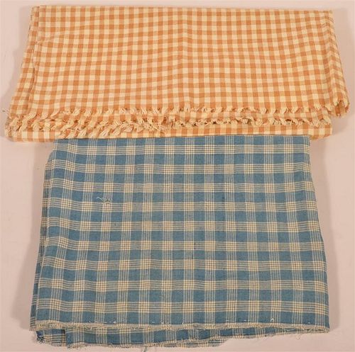 TWO PIECES OF ANTIQUE CHECKED FABRIC.Two