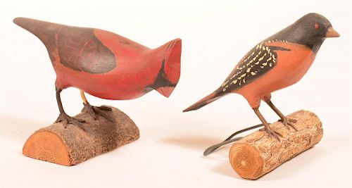 TWO CARVED AND PAINTED BIRD FIGURES.Two