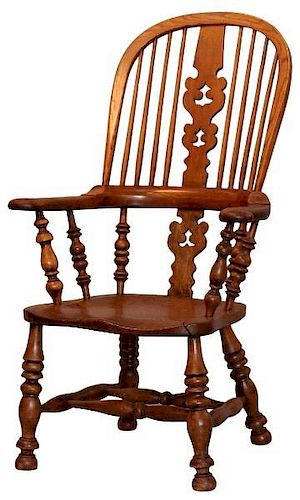 AN ENGLISH OAK WINDSOR CHAIR, EARLY