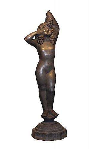 CAST IRON FIGURE OF BACCHIC MAIDEN,