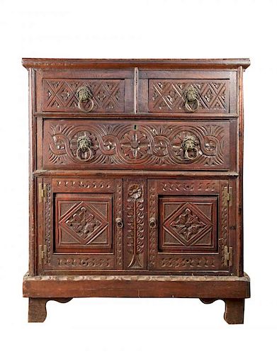 A JACOBEAN STYLE OAK CHEST OF DRAWERS,