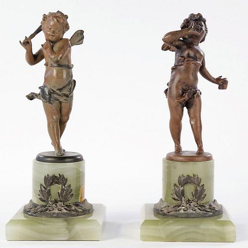 A PAIR OF COLD PAINTED BRONZE CHERUBS