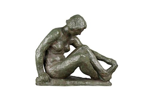SEATED NUDE DANCER, HOLDING HER FOOT,