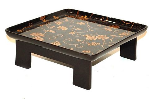 A JAPANESE BLACK AND GOLD LACQUER