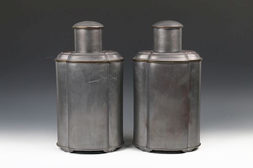 A PAIR OF PEWTER TEA CADDIES AND 39d011