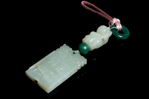 A JADE PENDANTThe pendant comprising 39d1f5