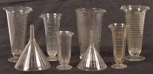 EIGHT PHARMACIST GLASS BEAKERS