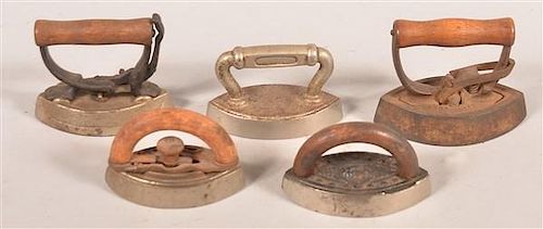 FIVE ANTIQUE MINIATURE SAD IRONS.Five