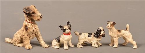 FOUR HUBLEY CAST PAINTED CAST IRON DOG