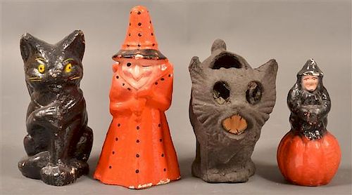 FOUR HALLOWEEN PAPER MACHE CANDY CONTAINERS.Four