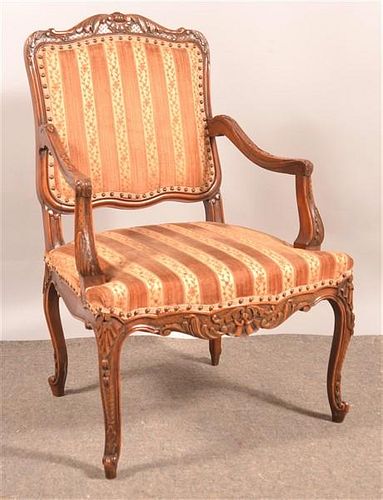 ANTIQUE LOUIS XV STYLE CARVED ARMCHAIR.Antique