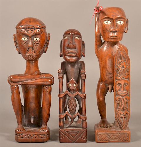 THREE INDONESIAN CARVED PROTECTOR