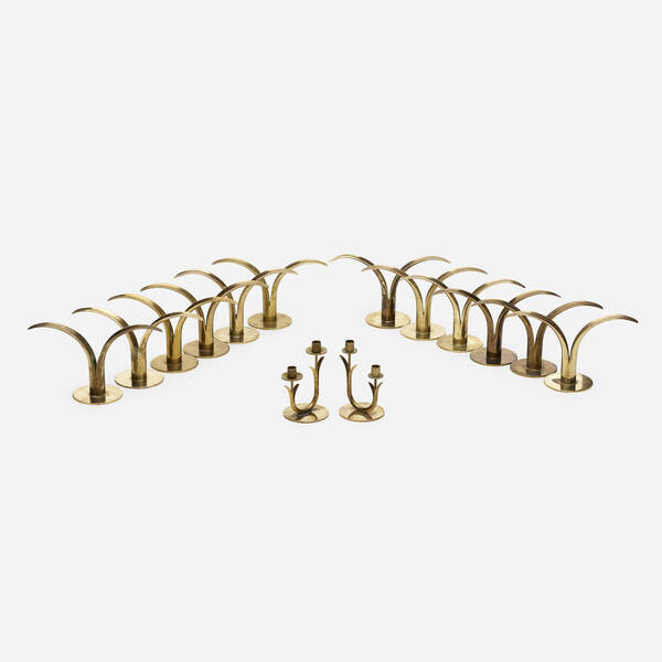 Ystad Collection of fourteen candlesticks  39e826