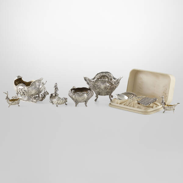 . Collection of twelve putti tablewares.
