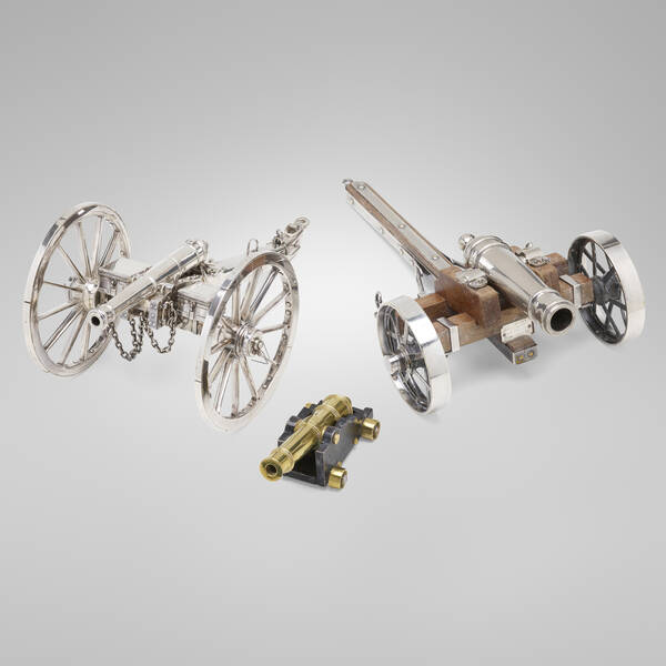 . Collection of three model cannons.