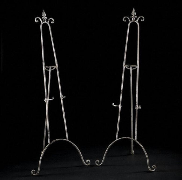 IRON EASELSA pair of iron easels 39ded3