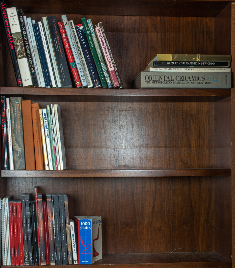 THREE SHELVES OF BOOKS, MOSTLY