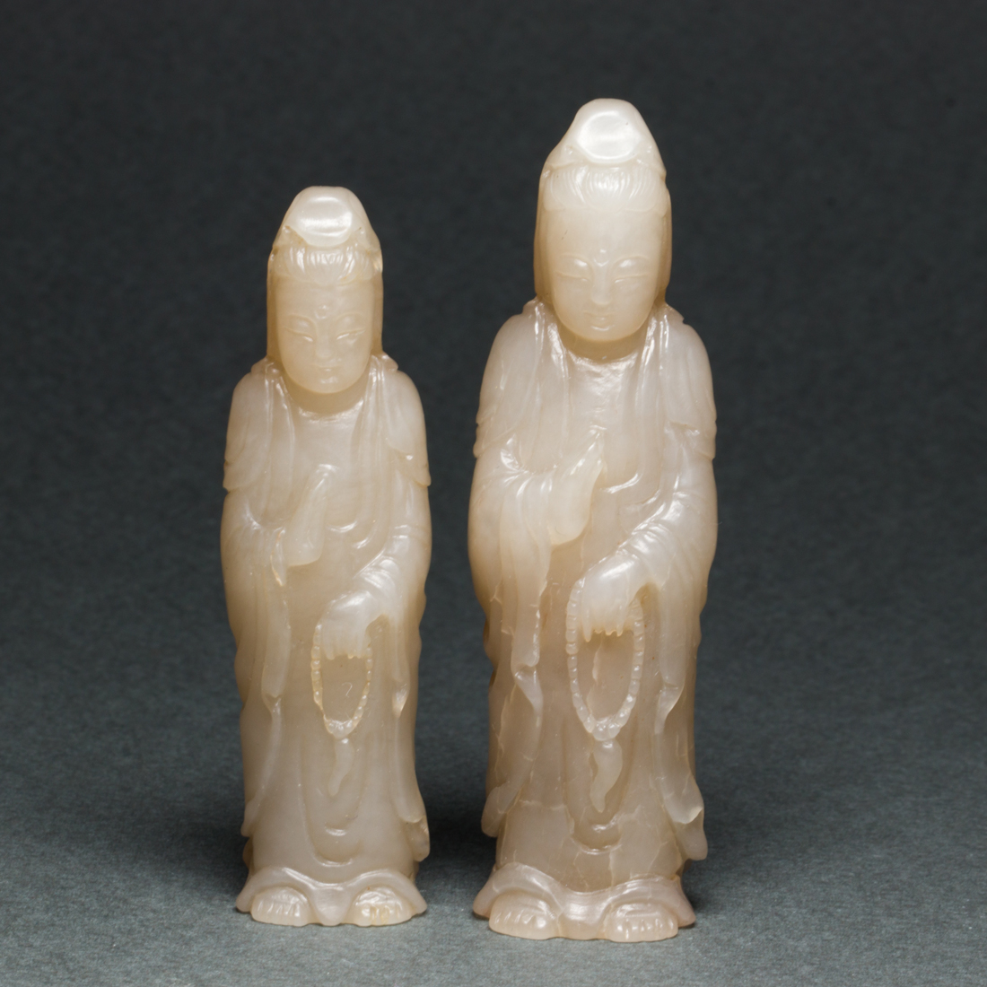 TWO CHINESE JADE GUANYIN TOGGLES
