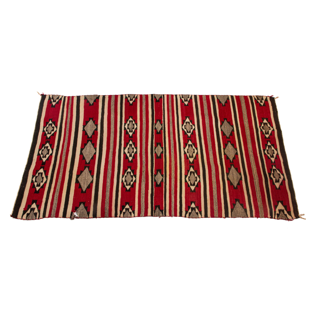 A NAVAJO BLANKET, THE IVORY, BLACK,