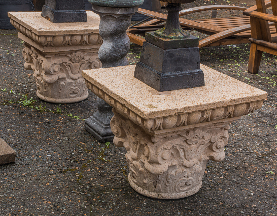 A PAIR OF CORINTHIAN CAPITALS A