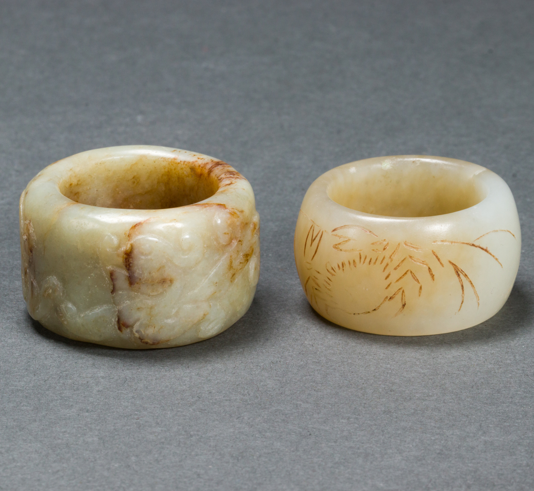 TWO CHINESE JADE ARCHER'S RINGS