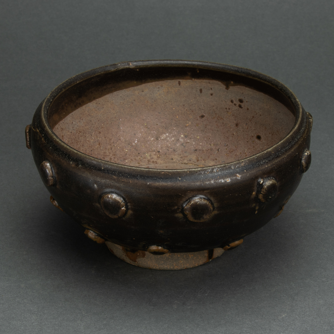 CHINESE BLACK GLAZED ALMS BOWL