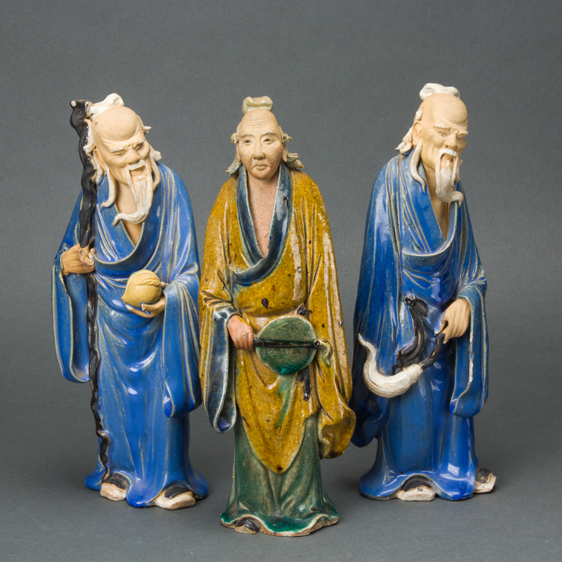 THREE CHINESE SHIWAN FIGURES Three