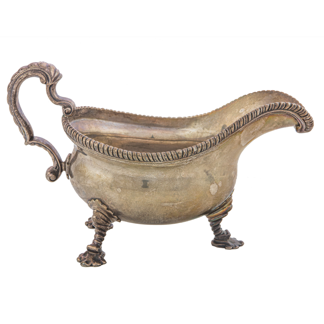 A GEORGE II STERLING TRIPOD GRAVY BOAT,