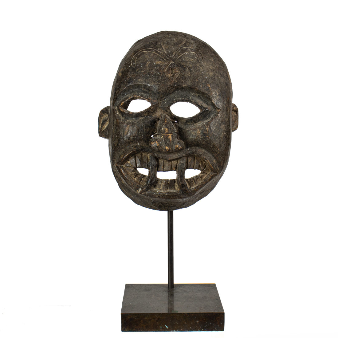 AN ANIMISTIC FANGED MASK OF CARVED 3a1643