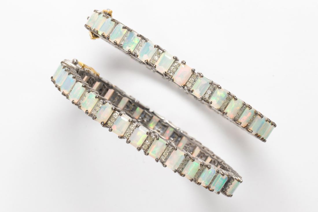 A PAIR OF OPAL AND DIAMOND BRACELETS