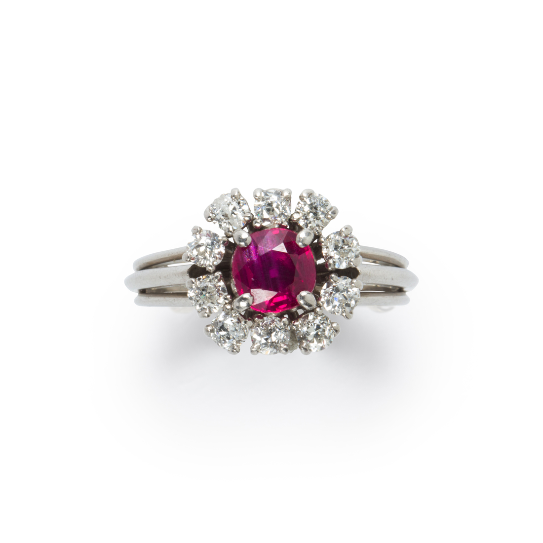 A RUBY, DIAMOND AND PLATINUM RING