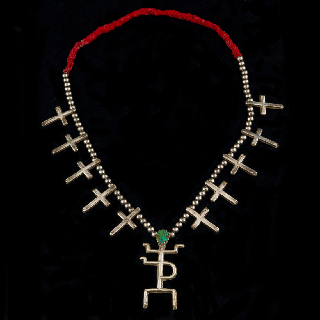 A NAVAJO COIN SILVER NECKLACE WITH