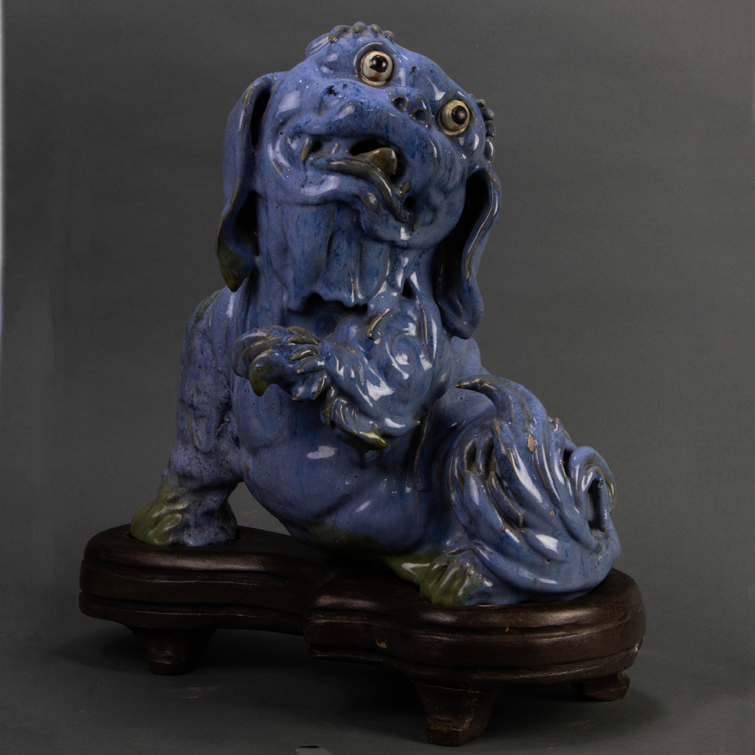 CHINESE FLAMBE GLAZED FIGURE OF A GUARDIAN