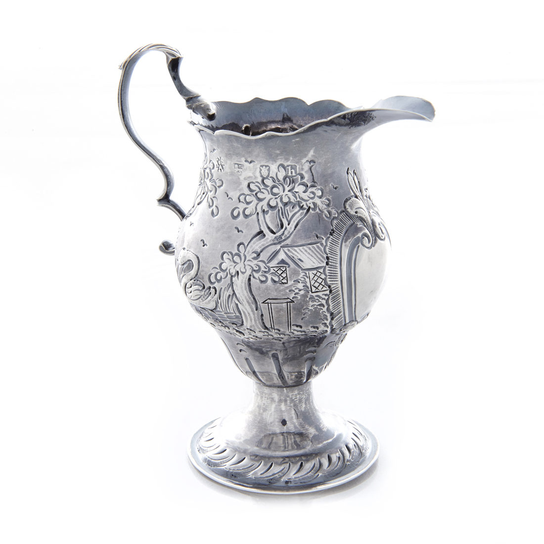 AN ENGLISH STERLING FOOTED CREAMER 3a1e32