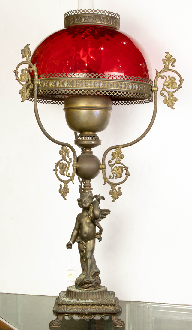 VICTORIAN PATINATED METAL AND RED GLASS