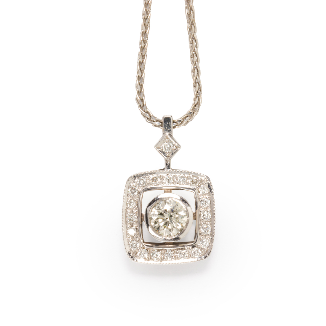 A DIAMOND AND FOURTEEN KARAT WHITE 3a1f70