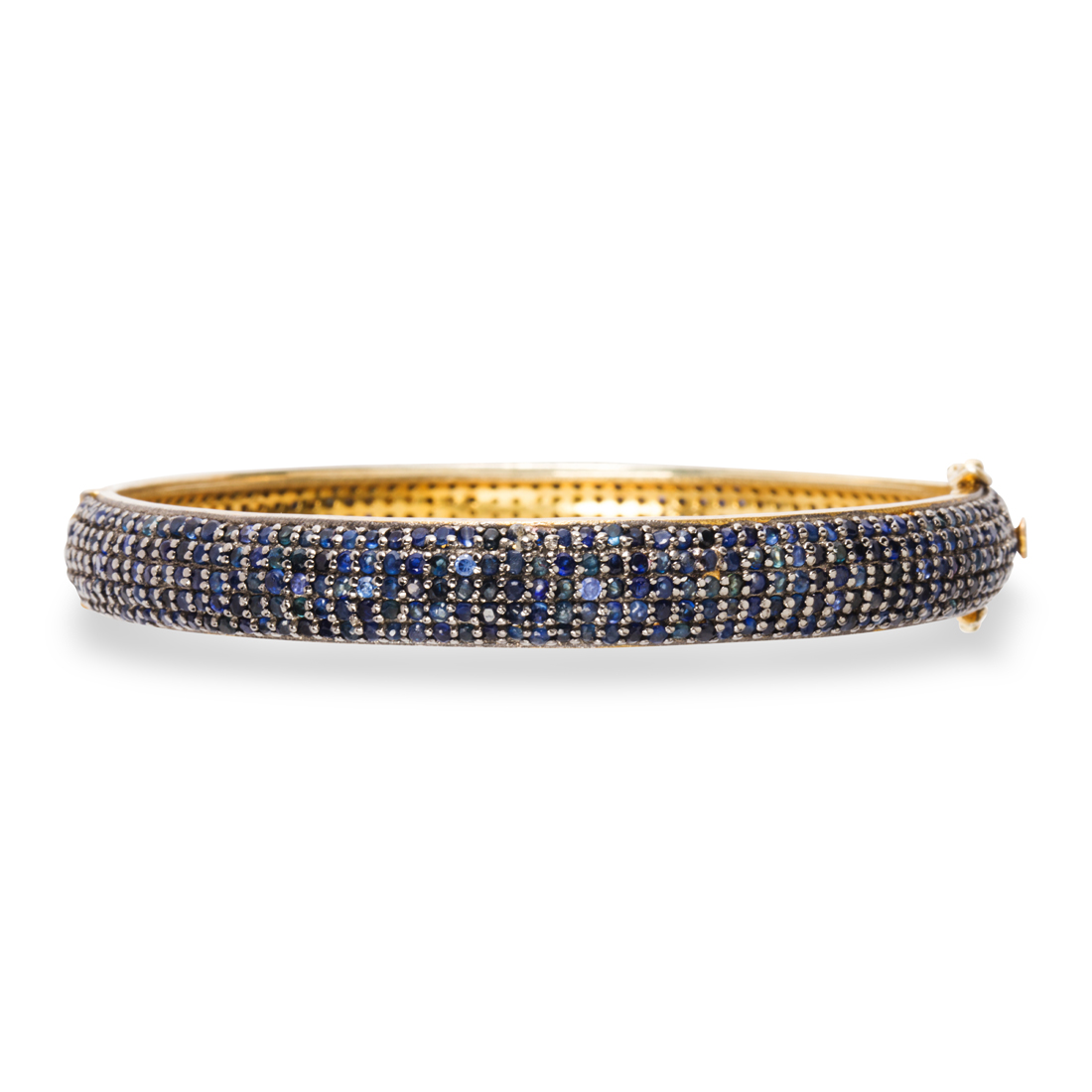 A SAPPHIRE BANGLE A sapphire bangle designed 3a1fef