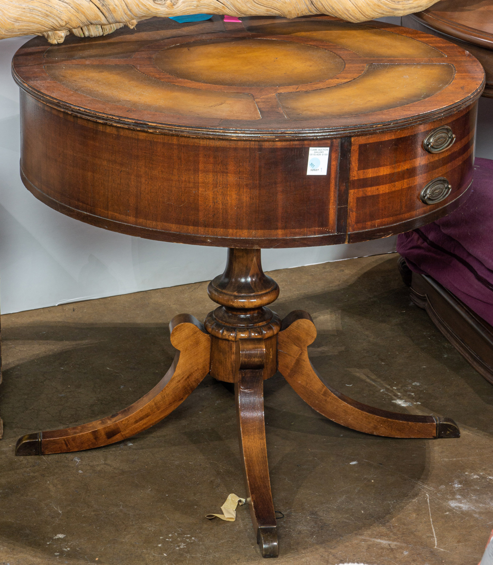 A REGENCY STYLE DRUM TABLE WITH