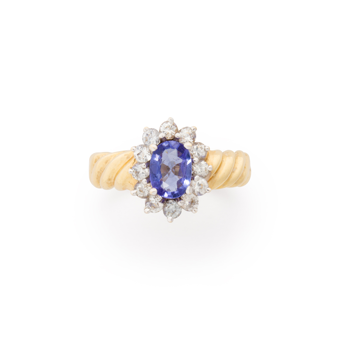 A TANZANITE, WHITE SAPPHIRE AND